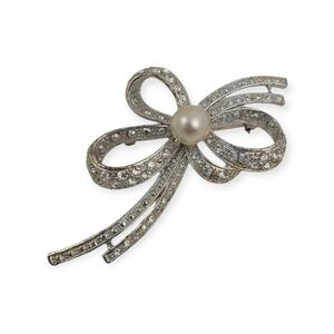 Vintage 1980s Elegant Pave Silver Bow Brooch with Pearl Accent.